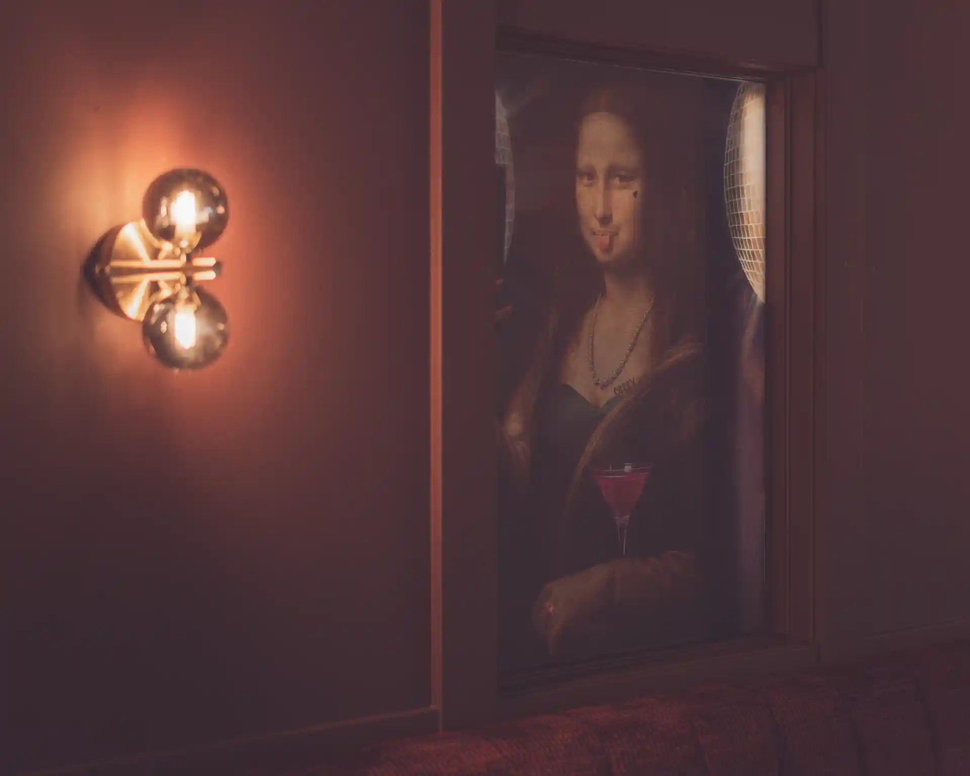 Mona Lisa having a drink.